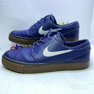 Nike Blue Athletic Shoes with White Swoosh